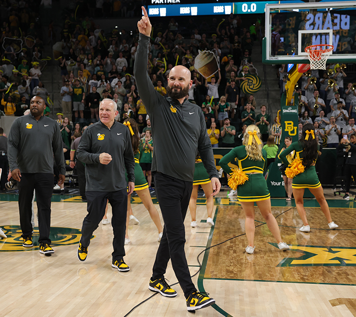 John Jakus pointing to the crowd.